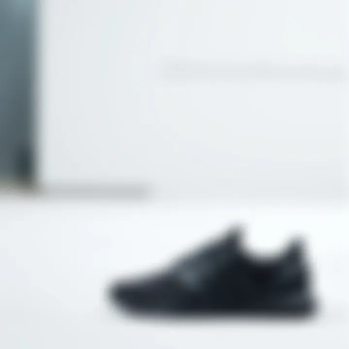 Stylish black athletic shoes on a clean background