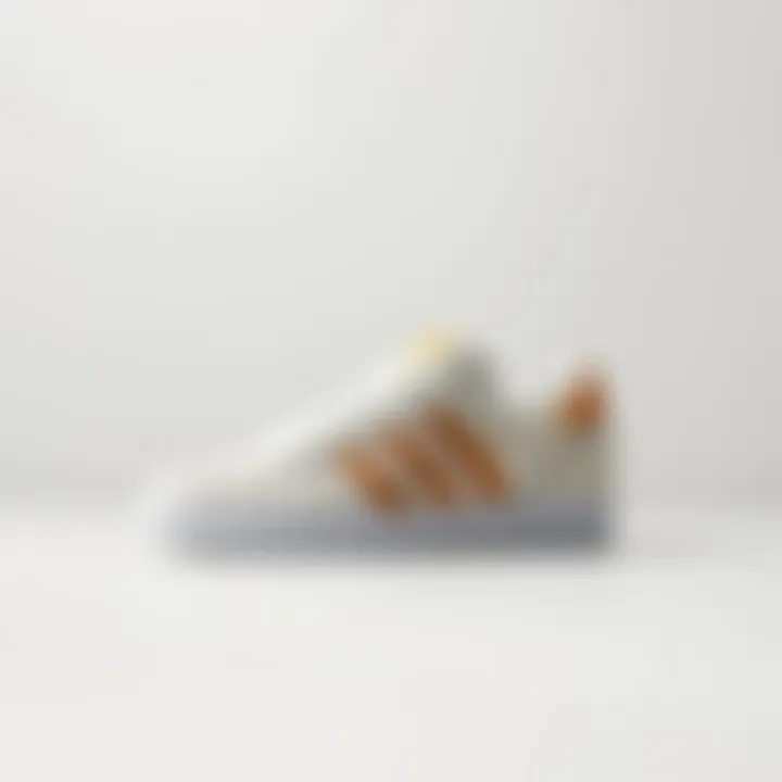 Adidas Forum Low Beige displayed on a clean, minimalist surface