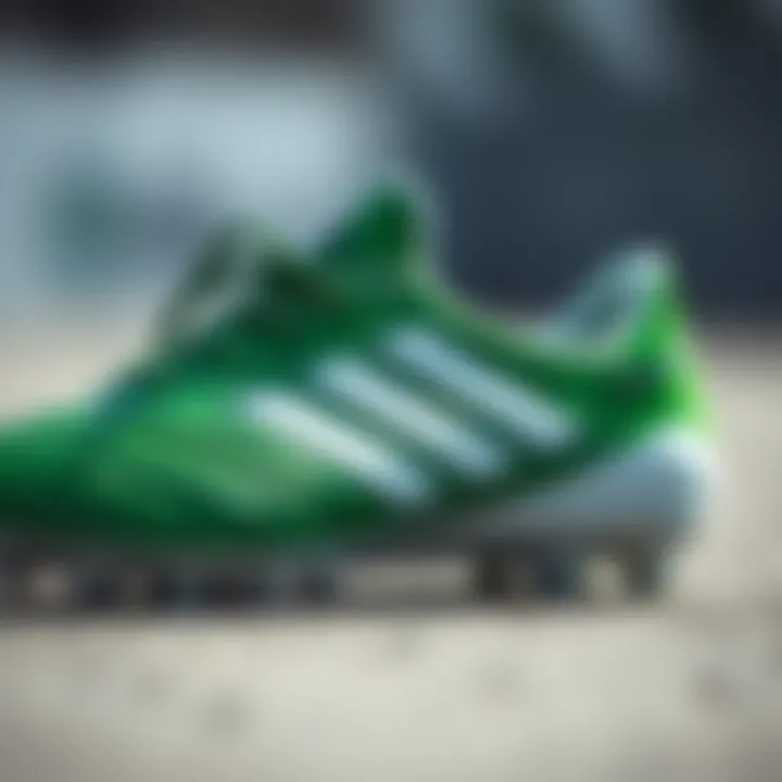 Close-up of Adidas green and white cleats showcasing design details