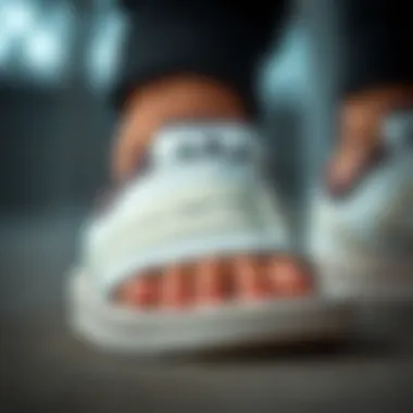 Close-up of Adidas slides showcasing material texture