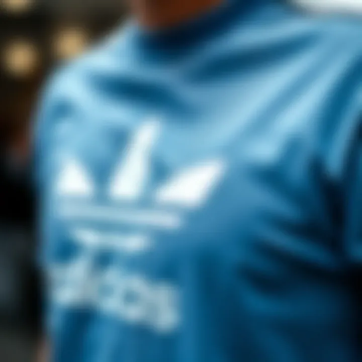 The Iconic Adidas Logo Close-up of Adidas logo on a t-shirt.