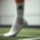 White Adidas socks showcasing premium fabric quality