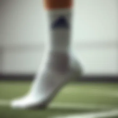 White Adidas socks showcasing premium fabric quality