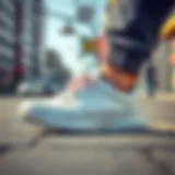 Stylish white sneakers on a city street