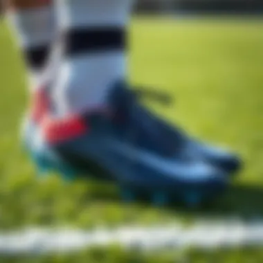 A fashionable pair of cleats poised on a football field
