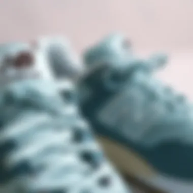 A close-up view showcasing the intricate design details of New Balance 408 Gri.