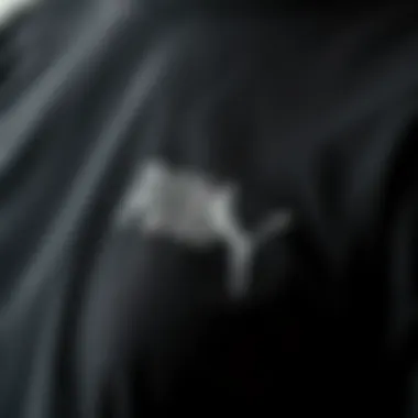 Close-up of fabric texture of Puma black t-shirt