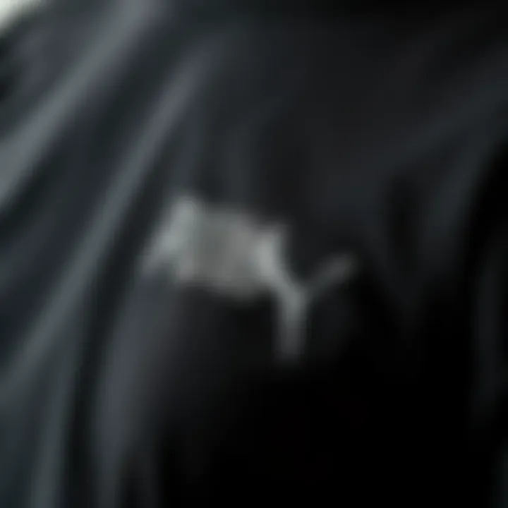 Close-up of fabric texture of Puma black t-shirt