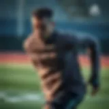 Tiro 21 in Action Dynamic athlete wearing Tiro 21 zip-up top during training